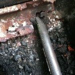 A rusted tube. A rusted out gas tube.